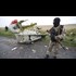 MH17: 'Russian missile parts' at Ukraine crash site - BBC News
