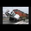 Video of trains plowing into cars and trucks: only republican garbage trucks go the direction that trains come from.
