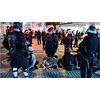 Feds investigating whether criminal actors were exerting 'command and control' over unrest as bricks appeared staged ahead of time to be thrown at cops