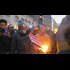 Manufactured dissent: Black Lives Matter Activists Torch American Flag At Apple Rally