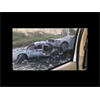 Burnt Cars, Buses and a Crashed Helicopter on a California Beach, the laser drones must have chased fleeing survivors onto the beach before