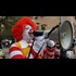 Joe Biggs dresses as 'Donald McRonald' McD's Ethetical mascott twin - bullhorns SXSW McD's tent warning about the ingredients in it's products, ticketed for 1st amendment