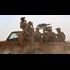 'Crusaders! Infidels! Dogs! Get out!' American-backed rebels force US commandos to leave Syrian town