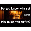 Did these police set fire to their own van? They certainly seem nonplussed about it.