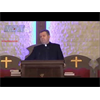 Reverend Ibrahim Naseir speaking during a mass held in the Presbyterian church of Aleppo, Syria: